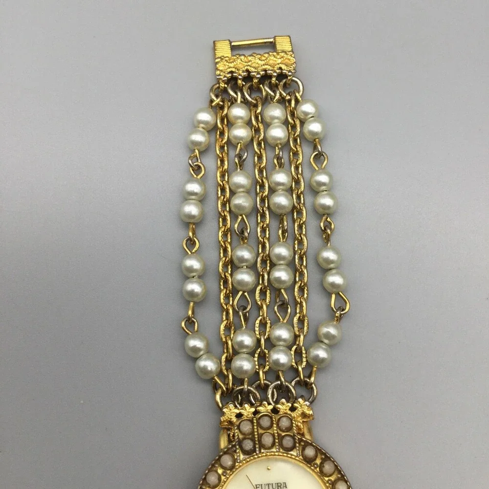 Futura Womens Watch 25mm MOP Dial Gold Tone Faux Pearl 3216 New Battery 6.75